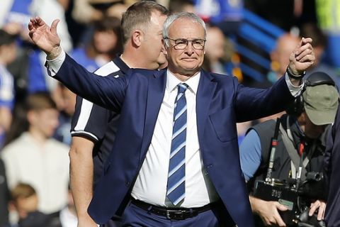 Leicester's team manager Claudio Ranieri applauds to supporters after the English Premier League soccer match between Chelsea and Leicester City at Stamford Bridge stadium in London, Sunday, May 15, 2016.(AP Photo/Frank Augstein)