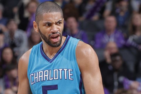 SACRAMENTO, CA - FEBRUARY 25: Nicolas Batum #5 of the Charlotte Hornets looks on during the game against the Sacramento Kings on February 25, 2017 at Golden 1 Center in Sacramento, California. NOTE TO USER: User expressly acknowledges and agrees that, by downloading and or using this photograph, User is consenting to the terms and conditions of the Getty Images Agreement. Mandatory Copyright Notice: Copyright 2017 NBAE (Photo by Rocky Widner/NBAE via Getty Images)