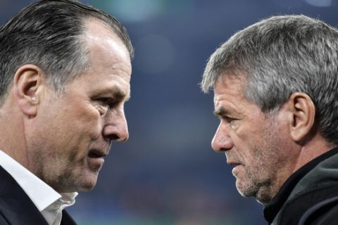Duesseldorf coach Friedhelm Funkel, right, talks to Schalke boss Clemens Tennis, left, prior the German soccer cup, DFB Pokal, match between FC Schalke 04 and Fortuna Duesseldorf in Gelsenkirchen, Germany, Wednesday, Feb. 6, 2019. Former Schalke manager and club legend Rudi Assauer died in the afternoon with 74 years. (AP Photo/Martin Meissner)