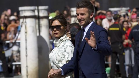 David Beckham and his wife Victoria arrive at Seville's cathedral on Saturday, Jun 15, 2019, to assist at the weeding of Real Madrid defender Sergio Ramos and model and presenter Pilar Rubio in Seville, Spain. (AP Photo/Antonio Pizarro)