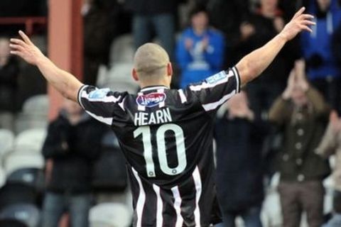 Grimsby Town Football Club versus Bath City FC at Blundell Park.
Hatrick hero Liam Hearn salutes the Pontoon stand fans after his 3rd goal.
Picture: Abby Ruston
Requested by: sport
Contact: 
Date: 21 jan 2012
Postcode:
Keywords: Grimsby football bath blundell


