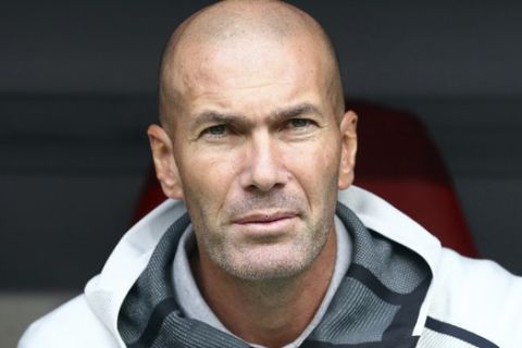 Real Madrid's coach Zinedine Zidane arrivers for the friendly soccer Audi Cup match between Real Madrid and Fenerbahce Istanbul at the Allianz Arena stadium in Munich, Germany, Wednesday, July 31, 2019. (AP Photo/Matthias Schrader)