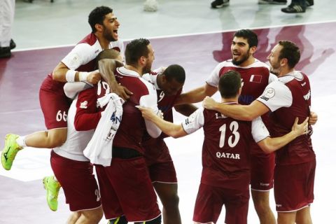 Qatari players celebrate after winning the Qatar 2015 24th Men's Handball World Championship semi final match between Poland and Qatar at the Lusail Multipurpose Hall outside Doha, Qatar 30 January 2015. Qatar 2015 via epa/Diego Azubel
