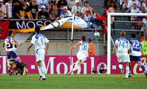 , 20 June 2004 during their European Nations Championship football match at Faro stadium. Greece and Russia are competing in Group A with Spain and host Portugal. 
 AFP PHOTO Aris MESSINIS