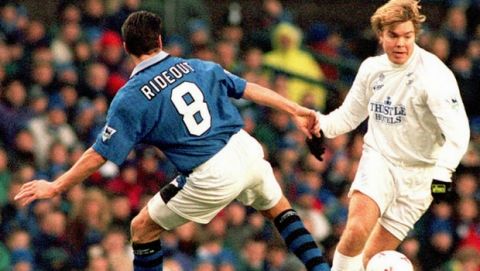 Leed's Tomas Brolin (right), attempts to get past Everton's Paul Rideout during the English Premier League soccer match at Everton's Goodison Park stadium, in Liverpool, Saturday Dec. 30, 1995. Everton won the match 2-0.(AP Photo/Richard Williams) **UNITED KINGDOM OUT**