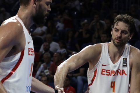 Spain's Pau Gasol, right, comforts his brother Marc left, as he is forced to leave the court due to an injury during their Eurobasket European Basketball Championship bronze medal match against Russia in Istanbul, Sunday, Sept. 17. 2017. (AP Photo/Thanassis Stavrakis)