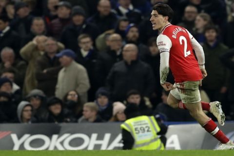 Arsenal's Hector Bellerin celebrates after scoring his side's second goal during the English Premier League soccer match between Chelsea and Arsenal at Stamford Bridge Stadium in London, Tuesday, Jan. 21, 2020. (AP Photo/Matt Dunham)