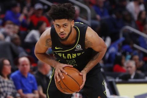 Atlanta Hawks guard Tyler Dorsey (2) plays against the Detroit Pistons in the first half of an NBA basketball game in Detroit, Wednesday, Feb. 14, 2018. (AP Photo/Paul Sancya)