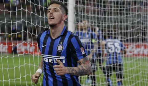 Inter Milan's Stevan Jovetic celebrates after scoring during a Serie A soccer match between Inter Milan and Udinese, at the San Siro stadium in Milan, Italy, Saturday, April 23, 2016. (AP Photo/Luca Bruno)