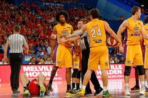 PERTH, AUSTRALIA - OCTOBER 24: Jesse Wagstaff of the Wildcats lies on the floor after being fouled off the ball by Josh Childress of the Kings during the round three NBL match between the Perth Wildcats and the Sydney Kings at Perth Arena on October 24, 2014 in Perth, Australia.  (Photo by Will Russell/Getty Images)