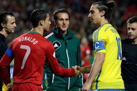 Portugal's Cristiano Ronaldo, left, and Sweden's Zlatan Ibrahimovic shake hands before the World Cup qualifying playoff first leg soccer match between Portugal and Sweden Friday, Nov. 15 2013, at the Luz stadium in Lisbon. (AP Photo/Armando Franca)