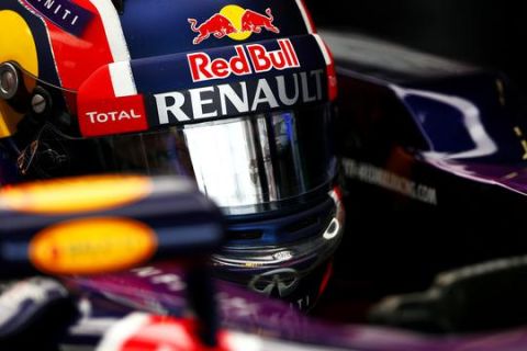 SUZUKA, JAPAN - SEPTEMBER 26:  Daniil Kvyat of Russia and Infiniti Red Bull Racing sits in his car in the garage during final practice for the Formula One Grand Prix of Japan at Suzuka Circuit on September 26, 2015 in Suzuka.  (Photo by Dan Istitene/Getty Images)