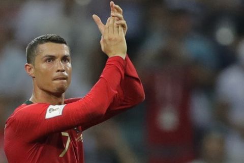 Portugal's Cristiano Ronaldo applauds after the group B match between Portugal and Spain at the 2018 soccer World Cup in the Fisht Stadium in Sochi, Russia, Friday, June 15, 2018. (AP Photo/Sergei Grits)