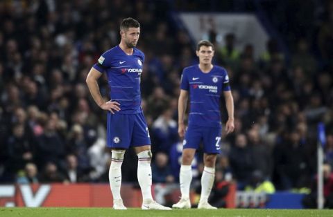 Chelsea's Gary Cahill (left) and Andreas Christensen react after conceding a second goal during the English League Cup 4th round soccer match between Chelsea and Derby County in London, Wednesday, Oct. 31, 2018. (Nick Potts/PA via AP)