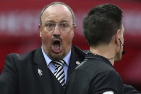 FILE - In this Saturday, Oct.6, 2018 file photo, Newcastle United's manager Rafael Benitez reacts to a decision by the referee during their English Premier League soccer match between Manchester United and Newcastle United at Old Trafford in Manchester, England. Keeping Newcastle in the Premier League for another year might be one of the greatest achievements in Benitezs coaching career. Newcastles has made its worst nine-game start to a league campaign since 1898. It has no wins in nine games, just two points, and five straight home losses. (AP Photo/Jon Super, File)
