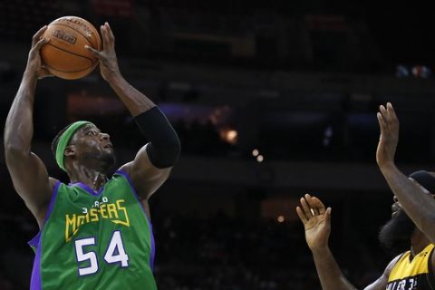 3-Headed Monsters Kwame Brown (54) attempts a shot as Killer 3's Killer 3's Reggie Evans (30) defends during Game 3 in the BIG3 Basketball League in Philadelphia, Pa., Sunday, July 16, 2017. (AP Photo/Rich Schultz)
