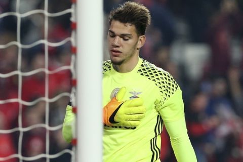 Benfica goalkeeper Ederson gestures at the end of a Portuguese league soccer match between Benfica and Sporting at the Luz stadium in Lisbon, Sunday, Dec. 11, 2016. Benfica won 2-1. (AP Photo/Armando Franca)