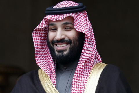 Saudi Arabia Crown Prince Mohammed bin Salman is welcomed by French Prime Minister Edouard Philippe in Paris, Monday April 9, 2018. Crown Prince Mohammed bin Salman is expected to sign a "strategic partnership" with Macron in the Elysee Palace on Tuesday. France is hoping to profit from the prince's shake-up of the conservative kingdom to forge a new kind of commercial relationship. (AP Photo/Francois Mori)