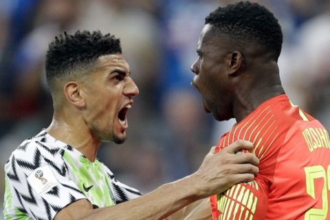 Nigeria's Leon Balogun, left, and Nigeria goalkeeper Francis Uzoho react after Iceland's Gylfi Sigurdsson missed a penalty kick during the group D match between Nigeria and Iceland at the 2018 soccer World Cup in the Volgograd Arena in Volgograd, Russia, Friday, June 22, 2018. (AP Photo/Andrew Medichini)