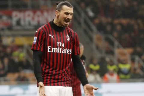 AC Milan's Zlatan Ibrahimovic reacts after missing a scoring chance during the Serie A soccer match between AC Milan and Torino at the San Siro stadium, in Milan, Italy, Monday, Feb. 17, 2020. (AP Photo/Antonio Calanni)