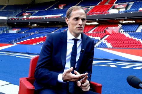 New Paris Saint-Germain coach Thomas Tuchel speaks during an interview with the Associated Press at Parc des Prince stadium in Paris, France, Sunday, May 20, 2018. The 44-year-old German joined PSG on a two-year deal. He replaces Unai Emery, whose two-year contract was not renewed after PSG again failed to get far in the Champions League. (AP Photo/Michel Euler)
