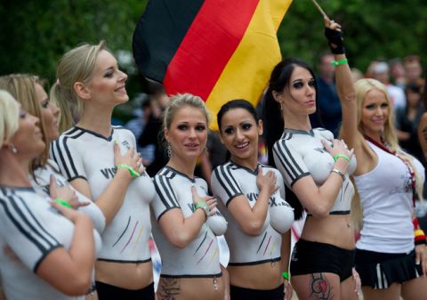 Porn actresses with body paint football jerseys in the colors of Germany poses as they take part in a fun soccer match of Germany vs Denmark on June 16, 2012 in Berlin, one day before the Euro 2012 football championship's match Germany vs Denmark to take place in Lviv, Ukraine. In the fun match, the girls of Denmark won 13-1.     AFP PHOTO / JOHANNES EISELEJOHANNES EISELE/AFP/GettyImages