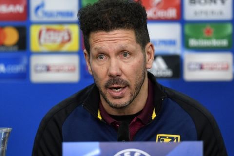 Atletico's head coach Diego Simeone talks to the media prior the Champions League round of 16 first leg soccer match against Bayer Leverkusen in Leverkusen, Germany, Monday, Feb. 20, 2017. (AP Photo/Martin Meissner)