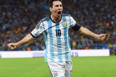 RIO DE JANEIRO, BRAZIL - JUNE 15: Lionel Messi of Argentina reacts after scoring his team's second goal during the 2014 FIFA World Cup Brazil Group F match between Argentina and Bosnia-Herzegovina at Maracana on June 15, 2014 in Rio de Janeiro, Brazil.  (Photo by Matthias Hangst/Getty Images)