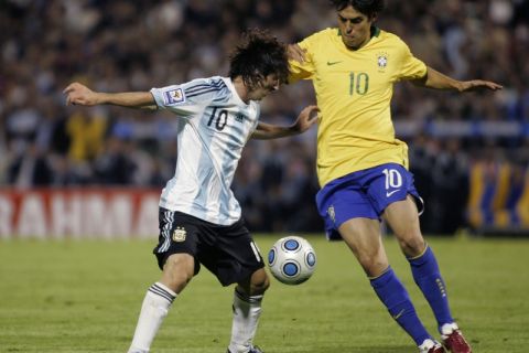 **  TO GO WITH MUNDIAL SUDAMERICA  ** FILE - In this Sept. 5, 2009, file photo, Argentina's Lionel Messi, left, fights for the ball with Brazil's Kaka during a 2010 World Cup qualifying soccer match in Rosario, Argentina. Brazil won 3-1. (AP Photo/Alberto Raggio, file)