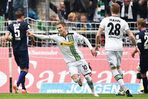 MOENCHENGLADBACH, GERMANY - APRIL 03:  Thorgan Hazard of Borussia Moenchengladbach (10) celebrates as he scores their first goal during the Bundesliga match between Borussia Moenchengladbach and Hertha BSC at Borussia-Park on April 3, 2016 in Moenchengladbach, Germany.  (Photo by Stuart Franklin/Bongarts/Getty Images)