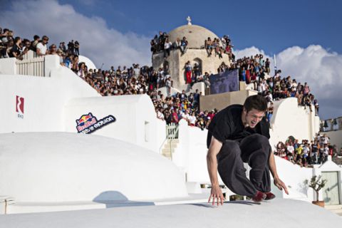 Jesse Peveril of Canada performs during the finals at the "Red Bull Art of Motion" freerunning competition on Santorini Island, Greece on October 3, 2015