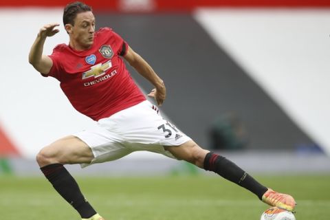 Manchester United's Nemanja Matic in action during the English Premier League soccer match between Manchester United and West Ham at the Old Trafford stadium in Manchester, England, Wednesday, July 22, 2020. (Martin Rickett/Pool via AP)