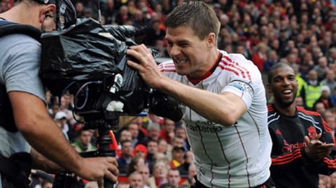 MANCHESTER, ENGLAND - SEPTEMBER 19:  (THE SUN OUT) Steven Gerrard of Liverpool celebrates after scoring the equlising goal during the Premier League match between Manchester United and Liverpool at Old Trafford on September 19, 2010 in Manchester, England.  (Photo by John Powell/Liverpool FC via Getty Images) *** Local Caption *** Steven Gerrard