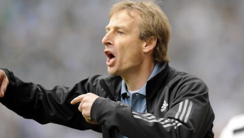 FILE - In this April 18, 2009 file phot, Bayern Munich's head coach Juergen Klinsmann directs his team during a German first division Bundesliga soccer match against Arminia Bielefeld in Bielefeld, Germany. U.S. Soccer moved quickly to name a replacement for fired coach Bob Bradley, announcing Klinsmann's hiring Friday, July 29, 2011. (AP Photo/Martin Meissner, File)