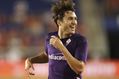 ACF Fiorentina's forward Federico Chiesa during the 2019 International Champions Cup soccer match against S.L. Benfica Soccer, Wednesday, July 24, 2019, in Harrison, N.J. (AP Photo/Vera Nieuwenhuis)