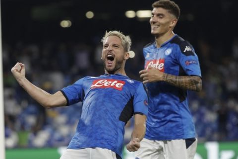 Napoli's Dries Mertens celebrates after scoring the opening goal of his team during the Champions League Group E soccer match between Napoli and Liverpool, at the San Paolo stadium in Naples, Italy, Tuesday, Sept. 17, 2019. (AP Photo/Gregorio Borgia)