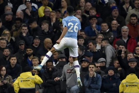 Manchester City's Riyad Mahrez celebrates after scoring his side's second goal during the English Premier League soccer match between Manchester City and Chelsea at Etihad stadium in Manchester, England, Saturday, Nov. 23, 2019. (AP Photo/Rui Vieira)