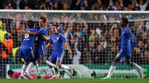 LONDON, ENGLAND - SEPTEMBER 19:  Oscar of Chelsea celebrates scoring their first goal with Frank Lampard of Chelsea during the UEFA Champions League Group E match between Chelsea and Juventus at Stamford Bridge on September 19, 2012 in London, England.  (Photo by Clive Rose/Getty Images)