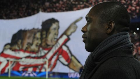 AC Milan's coach Clarence Seedorf looks on during the UEFA Champions League quarter-finals second leg football match Club Atletico de Madrid vs AC Milan at the Vicente Calderon stadium in Madrid on March 11, 2014.   AFP PHOTO/ JAVIER SORIANO        (Photo credit should read JAVIER SORIANO/AFP/Getty Images)