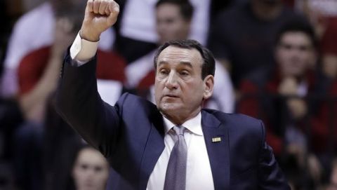 Duke coach Mike Krzyzewski motions to his team during the first half of an NCAA college basketball game against Indiana, Wednesday, Nov. 29, 2017, in Bloomington, Ind. (AP Photo/Darron Cummings)
