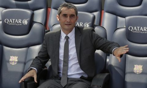 FC Barcelona's new signing coach Ernesto Valverde gestures during his official presentation at the Camp Nou stadium in Barcelona, Spain, Thursday, June 1, 2017. Former player Valverde was hired as the new coach, the club confirmed on Monday. (AP Photo/Manu Fernandez)