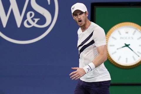 Andy Murray, of Great Britain, reacts to loosing a game during his match with Milos Raonic, of Canada, during the third round at the Western & Southern Open tennis tournament Tuesday, Aug. 25, 2020, in New York. (AP Photo/Frank Franklin II)