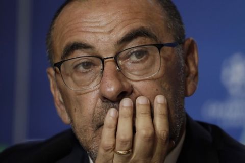 Juventus' head coach Maurizio Sarri listens to a question during a press conference at the Metropolitano stadium in Madrid, Spain, Tuesday Sept. 17, 2019. Juventus will play Atletico Madrid in a Group D Champions League soccer match on Wednesday. (AP Photo/Manu Fernandez)