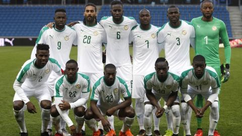 The Senegal national soccer team pose before a friendly soccer match between Senegal and Bosnia and Herzegovina at the Oceane stadium in Le Havre, northern France, Tuesday, March 27, 2018. (AP Photo/Francois Mori)