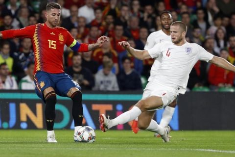 England's Eric Dier, right, stops Spain's Sergio Ramos during the UEFA Nations League soccer match between Spain and England at Benito Villamarin stadium, in Seville, Spain, Monday, Oct. 15, 2018. (AP Photo/Miguel Morenatti)