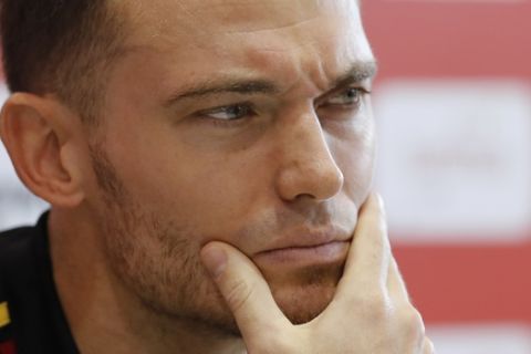 Belgium's Thomas Vermaelen grimaces as he listen to journalists' questions during a press conference at the 2018 soccer World Cup in Dedovsk, Russia, Sunday, July 8, 2018. (AP Photo/David Vincent)
