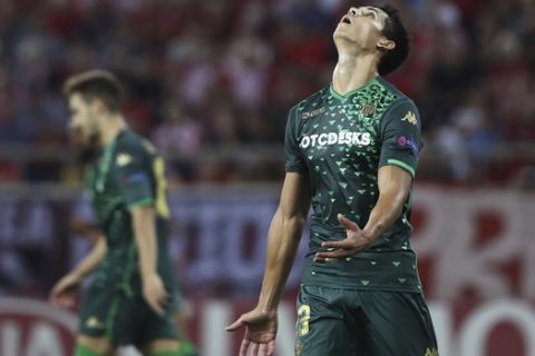 Real Betis' Aissa Mandi reacts after a missing opportunity to score during a Group F Europa League soccer match between Olympiakos Piraeus and Real Betis at the Karaiskakis Stadium, in Piraeus, near Athens, on Thursday, Sept. 20, 2018. (AP Photo/Petros Giannakouris)