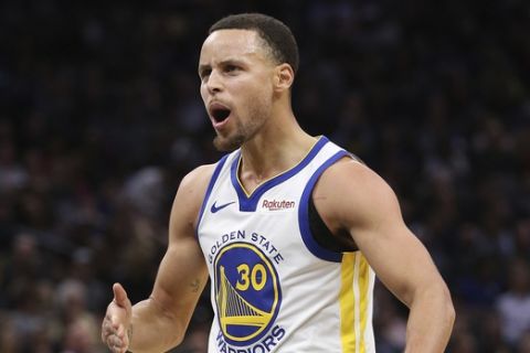 Golden State Warriors guard Stephen Curry reacts after scoring a 3-point basket during the second half of an NBA basketball game against the Sacramento Kings, Saturday, Jan. 5, 2019, in Sacramento, Calif. The Warriors won 127-123. (AP Photo/Rich Pedroncelli)