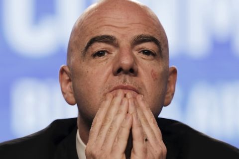 FIFA President Gianni Infantino participates in the annual conference of the South American Football Confederation, CONMEBOL, in Buenos Aires, Argentina, Thursday, April 12, 2018. The governing body of South American soccer has asked FIFA to expand the World Cup to 48 teams for the 2022 tournament in Qatar. (AP Photo/Martin Ruggiero)