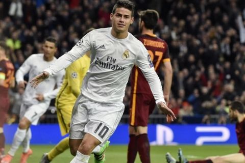"Real Madrid's Colombian midfielder James Rodriguez celebrates after scoring during the UEFA Champions League round of 16, second leg football match Real Madrid FC vs AS Roma at the Santiago Bernabeu stadium in Madrid on March 8, 2016. / AFP / GERARD JULIEN        (Photo credit should read GERARD JULIEN/AFP/Getty Images)"